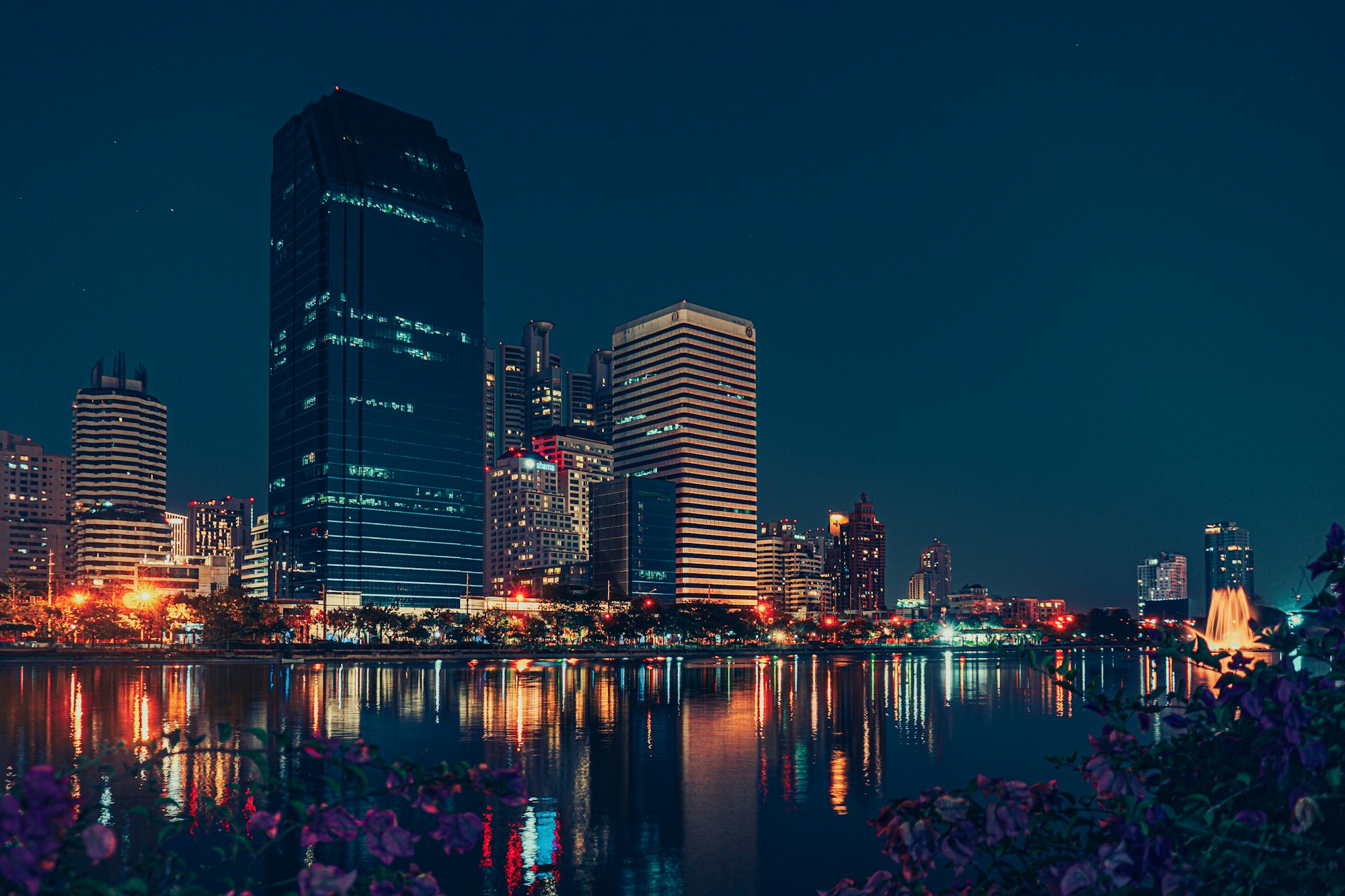 Bangkok skyline and reflections at night