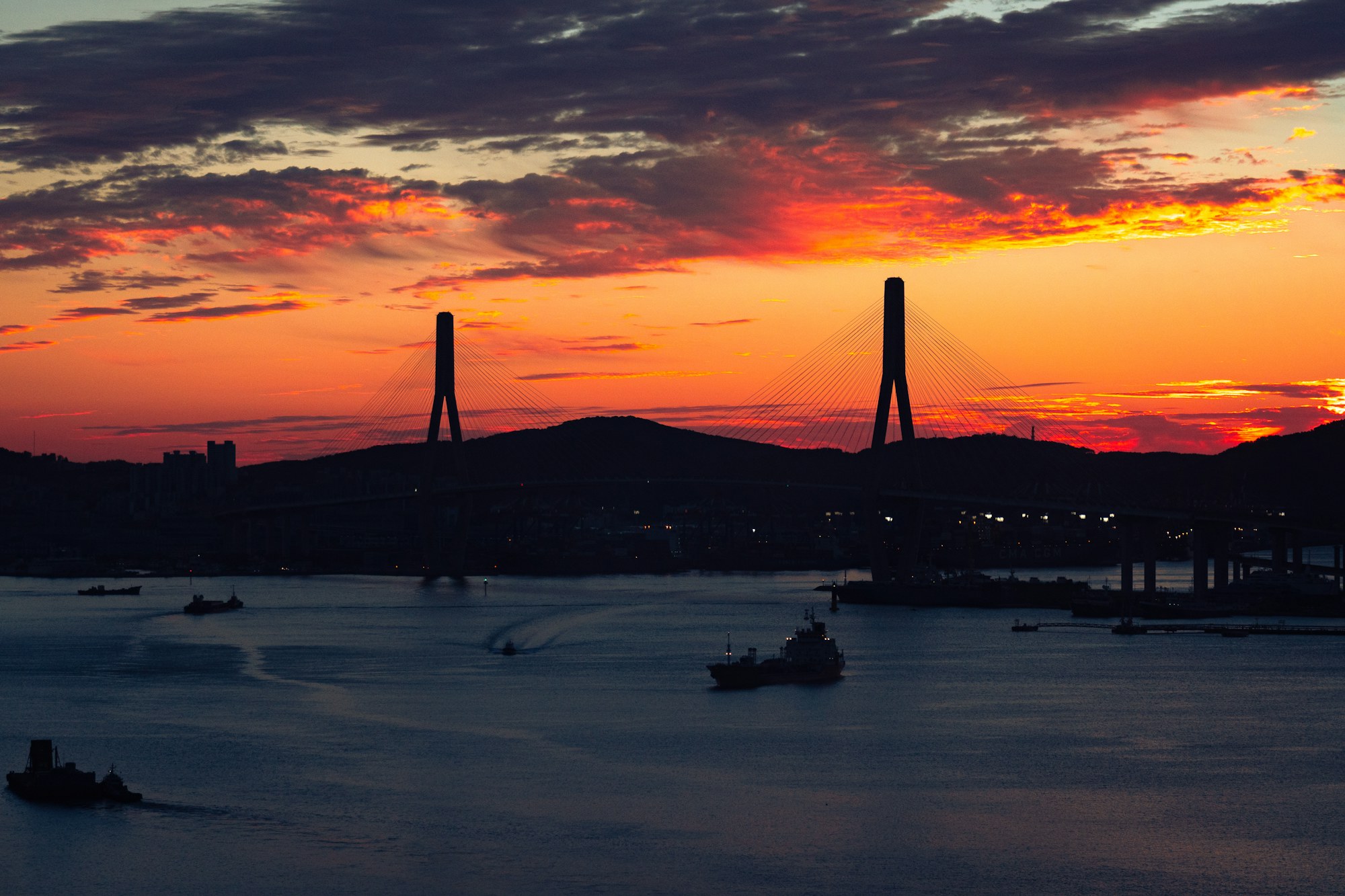 Busan harbour and bridge at sunset